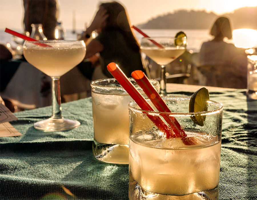 Drinks on the beach with all-inclusive packages to Mexico