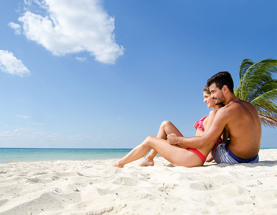 Couple on beach in Cancun Mexico