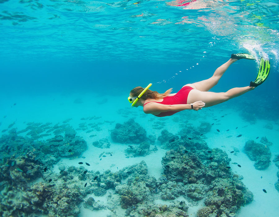 Girl snorkeling in the Bahamas